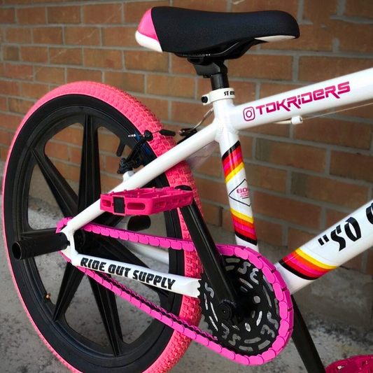 BMX Bikes Pink with snap-on chain caps and matching pink tires for a stylish custom look.