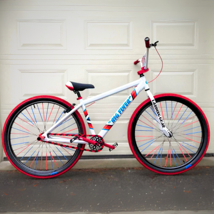 Big Wheelie bike featuring bold black and red accents, showcasing a stylish design and eye-catching wheels.