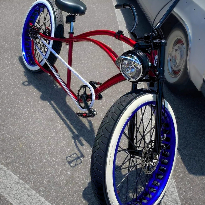 BMX Bikes Best Brands - custom red bike with wide tires and white rims, showcasing stylish design and unique features.