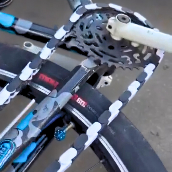 BMX Bicycle 16 with Black & White Two Tone Insane Chains on the pedal system for a stylish riding experience.