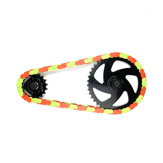Fixie Bikes Parts - Green & Orange Two Tone Insane Chains featuring vibrant colors and unique design for custom bikes.