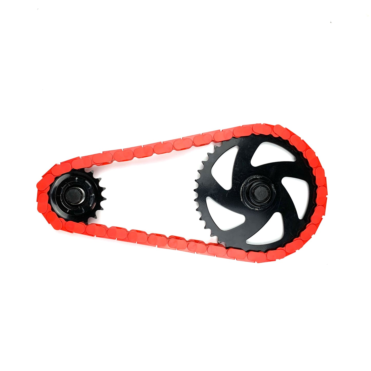 BMX Bikes Red featuring Insane Chains Red snap-on caps on a black chain and gears.