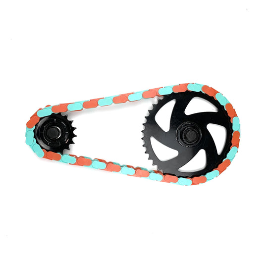 Chain Cover for Bikes in teal and orange showcasing a bold design with a bike chain and sprockets.