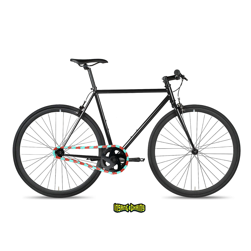 Colored Bike Chain in teal and red on a sleek black bike, showcasing vibrant two-tone design by Insane Chains.