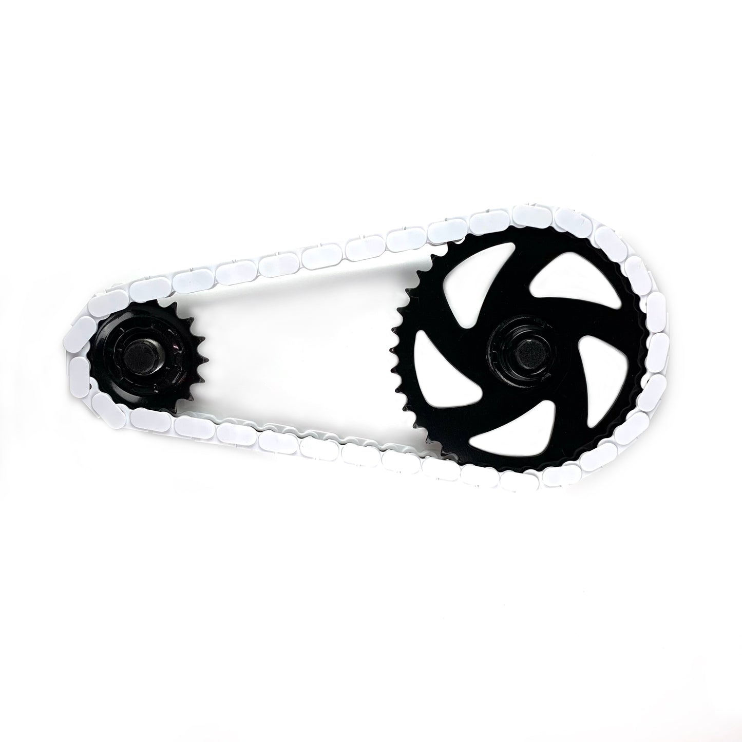 BMX Bikes Best Brands - White snap-on chain caps on a bike chain and sprocket for adults, teens, and kids.