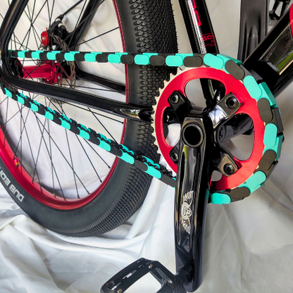 BMX Bikes Used featuring a black and teal two-tone chain with Insane Chains snap-on caps for a fresh look.