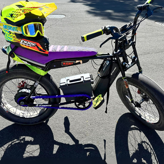 BMX Bikes Used with purple accessories, including snap-on chain caps and a colorful helmet.