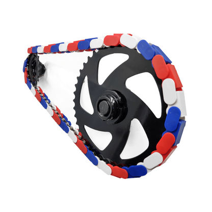 American Red White & Blue Tri Tone Snap-On Chain Caps on a bike chain with black sprocket
