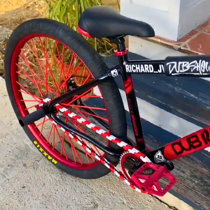 BMX Bikes Red featuring white and red two tone Insane Chains, showcasing bold colors and stylish design.