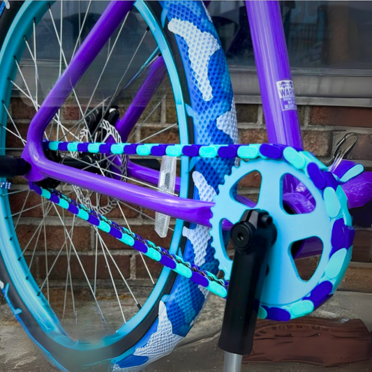 Childs 14 Inch Bike featuring vibrant purple and teal two-tone Insane Chains design.