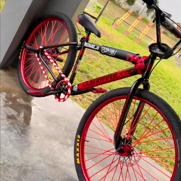 BMX Bikes Red with white and red Insane Chains, showcasing high-contrast colors and sleek design for stylish riding.