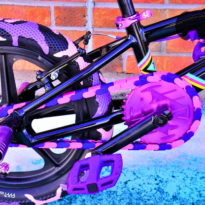 Childrens Bike 14 Inch features bold purple and pink two-tone Insane Chains, perfect for vibrant rides.