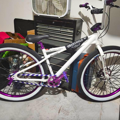 bmx bike with purple and white two tone features showcasing Insane Chains style.