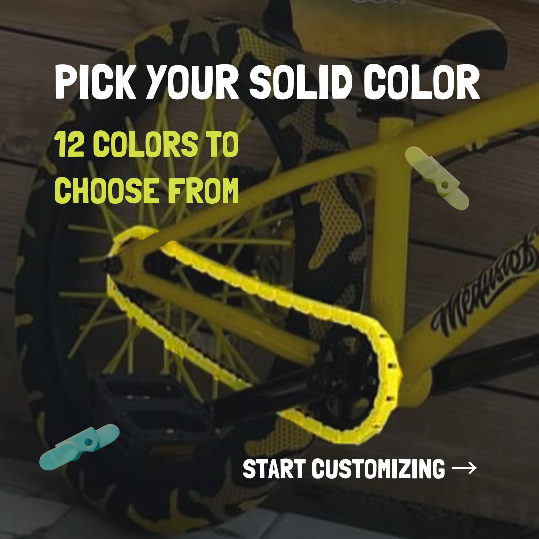 S E Bike & BMX Snap-On Chain Cap in yellow with text highlighting 12 solid color options for personalized bike customization.